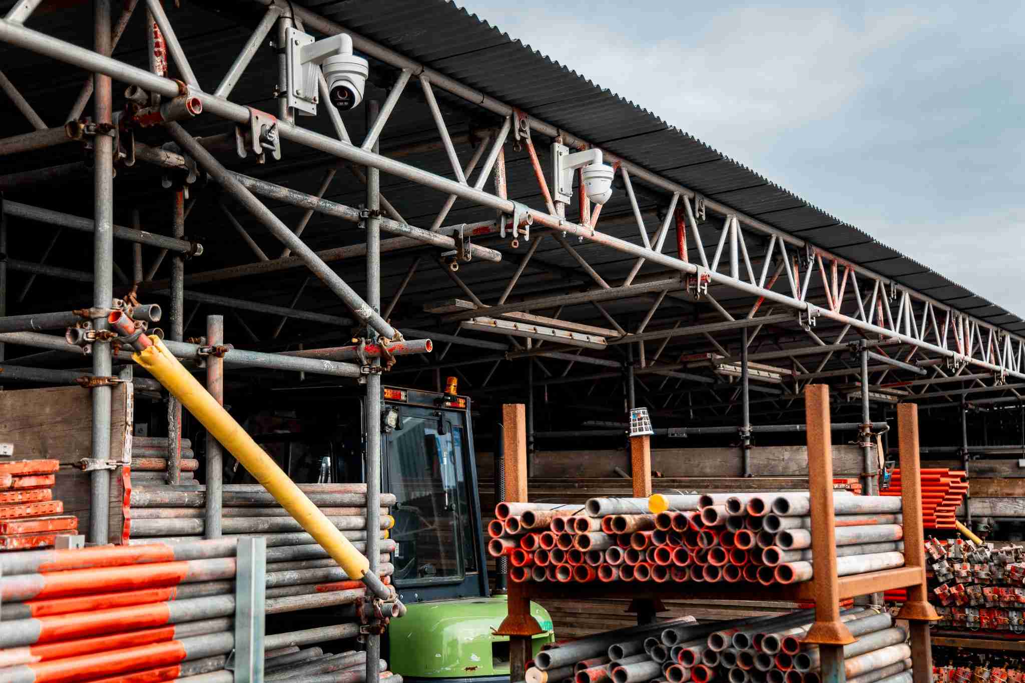 Hikvision CCTV cameras covering scaffold loading bays at a commercial yard in Barrow-in-Furness